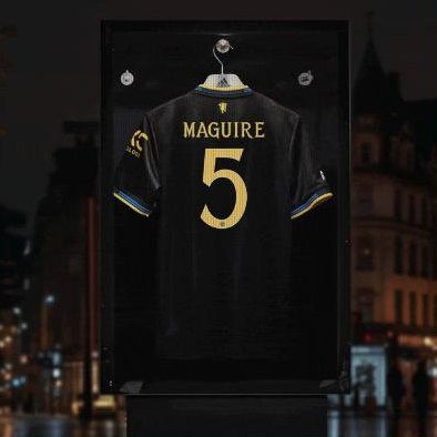Personalised Manchester United hero: a shirt printed Maguire 5 in a lit display case