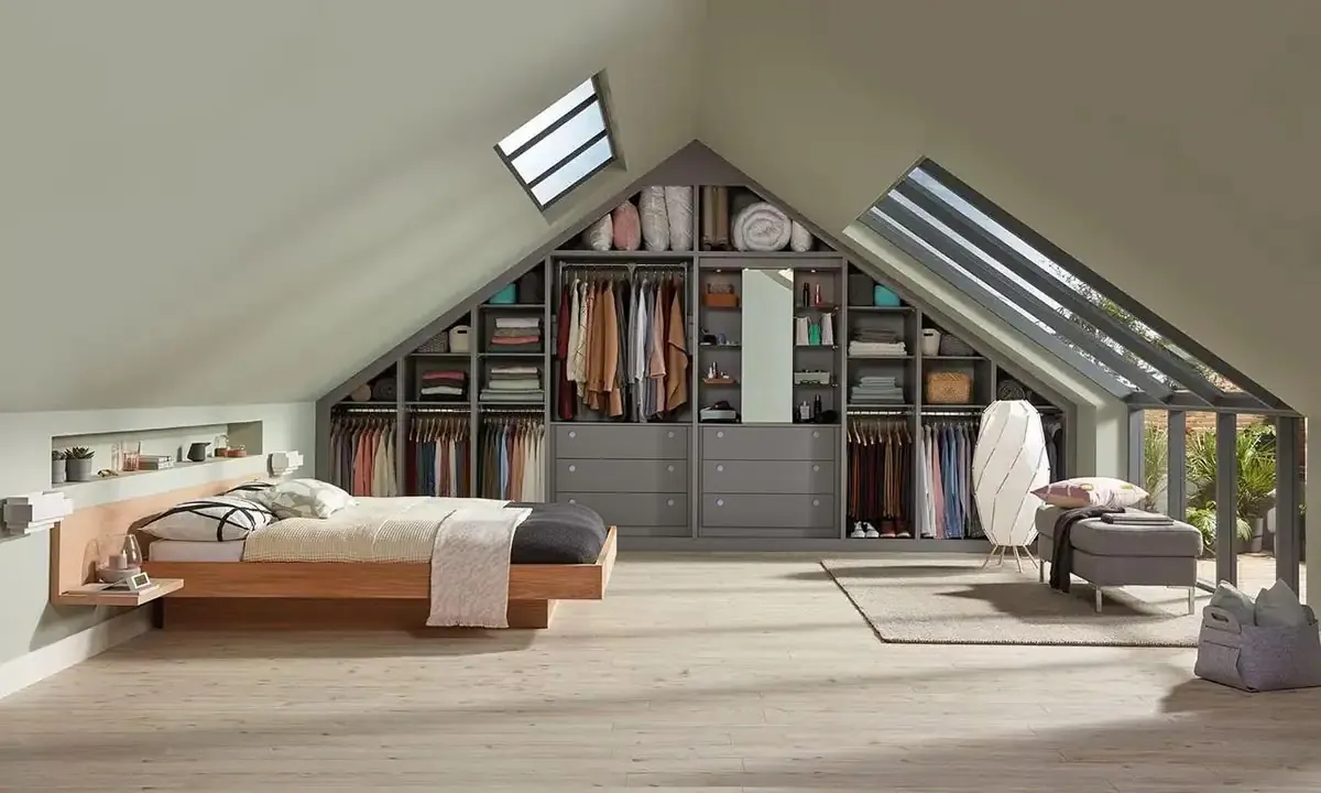 A Sharps fitted wardrobe built into the eaves of an attic bedroom